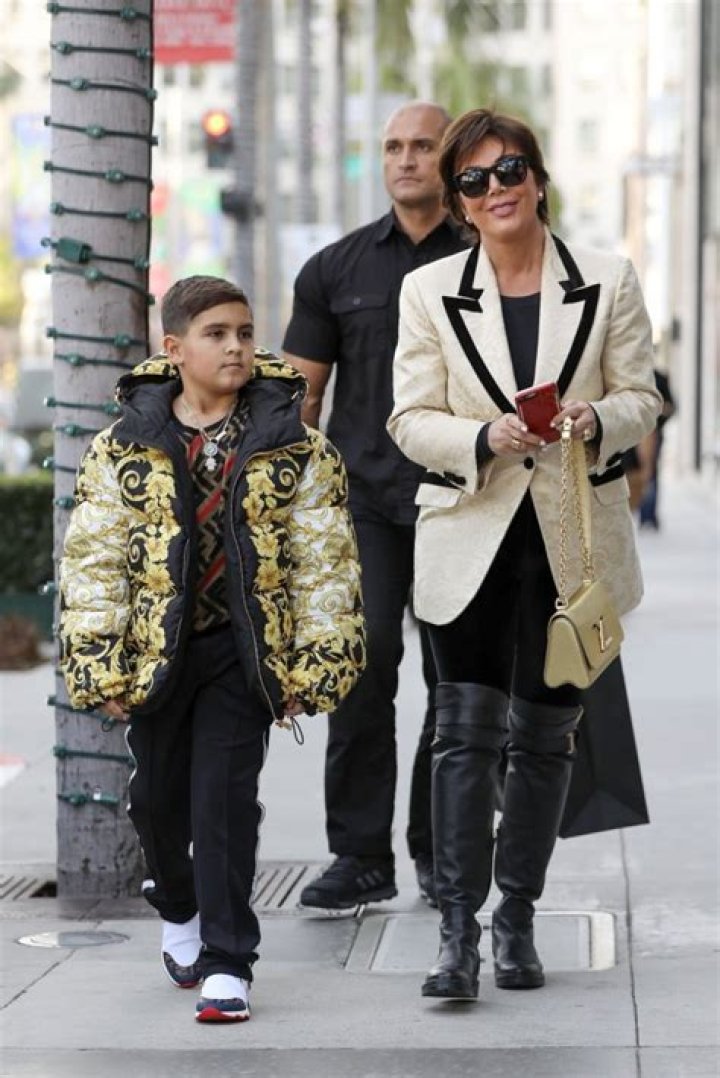 Beverly Hills, CA - Momager Kris Jenner gets her grandson Mason Disick an expensive looking Versace puffer jacket as they both go Christmas shopping in Beverly Hills with a bodyguard.Pictured: Kris Jenner, Mason Dash DisickBACKGRID USA 18 DECEMBER 2018 BYLINE MUST READ: Clint Brewer / BACKGRIDUSA: +1 310 798 9111 / : +44 208 344 2007 / *UK Clients - Pictures Containing ChildrenPlease Pixelate Face Prior To Publication*