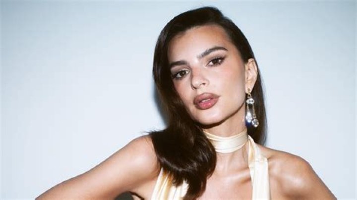 Emily Ratajkowski shows off her famous curves in a skimpy thong swimsuit in Miami Beach. The swimwear model's black one-piece left very little to the imagination as she cooled off with a dip in the pool at her upscale oceanfront hotel. Pictured: Emily Ratajkowski Ref: SPL5122407 151019 NON-EXCLUSIVE Picture by: AM / SplashNews.com Splash News and Pictures Los Angeles: 310-821-2666 New York: 212-619-2666 London: +44 (0)20 7644 7656 Berlin: +49 175 3764 166 World Rights